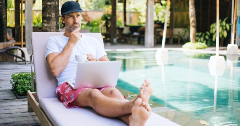 Can you bring your laptop to rehab featured image shows man poolside with laptop