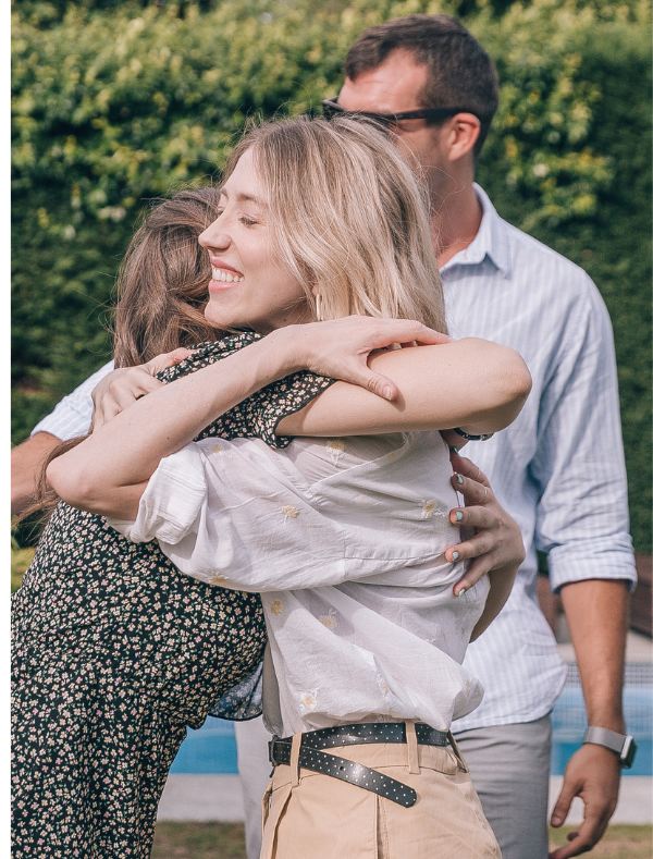 exec-rehab-alumni-program Executive rehab alumni program concept pic shows women embracing