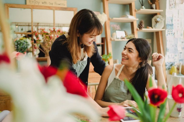 Can small business owners go to executive rehab concept pic shows florist in her shop after successful attending treatment